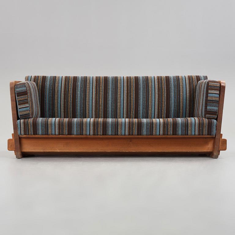 Axel Einar Hjorth, a stained pine "Lovö" sofa, Nordiska Kompaniet, Sweden 1930's.
