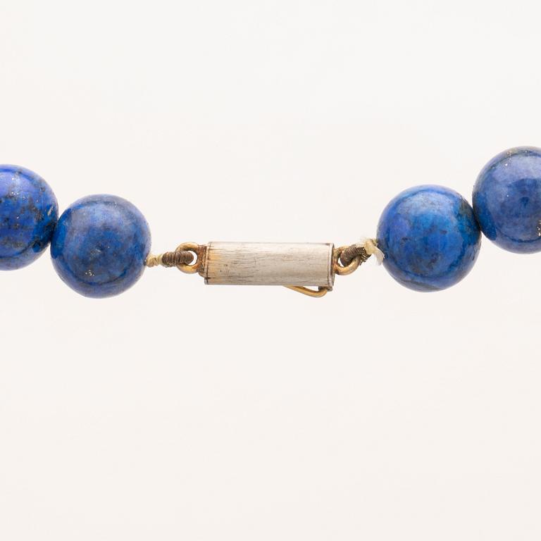 A set of lapis lazuli earrings and necklace.