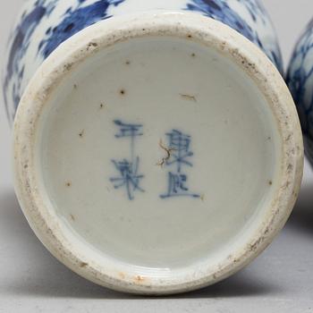 Three (2+1) blue and white porcelain vases, Qing dynasty, late 19th century.