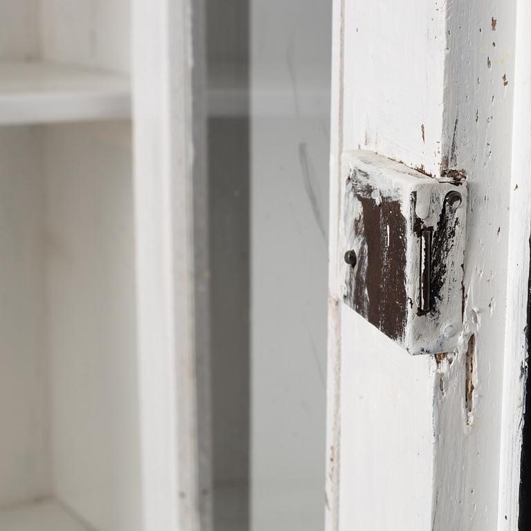 Display cabinet, circa 1900.