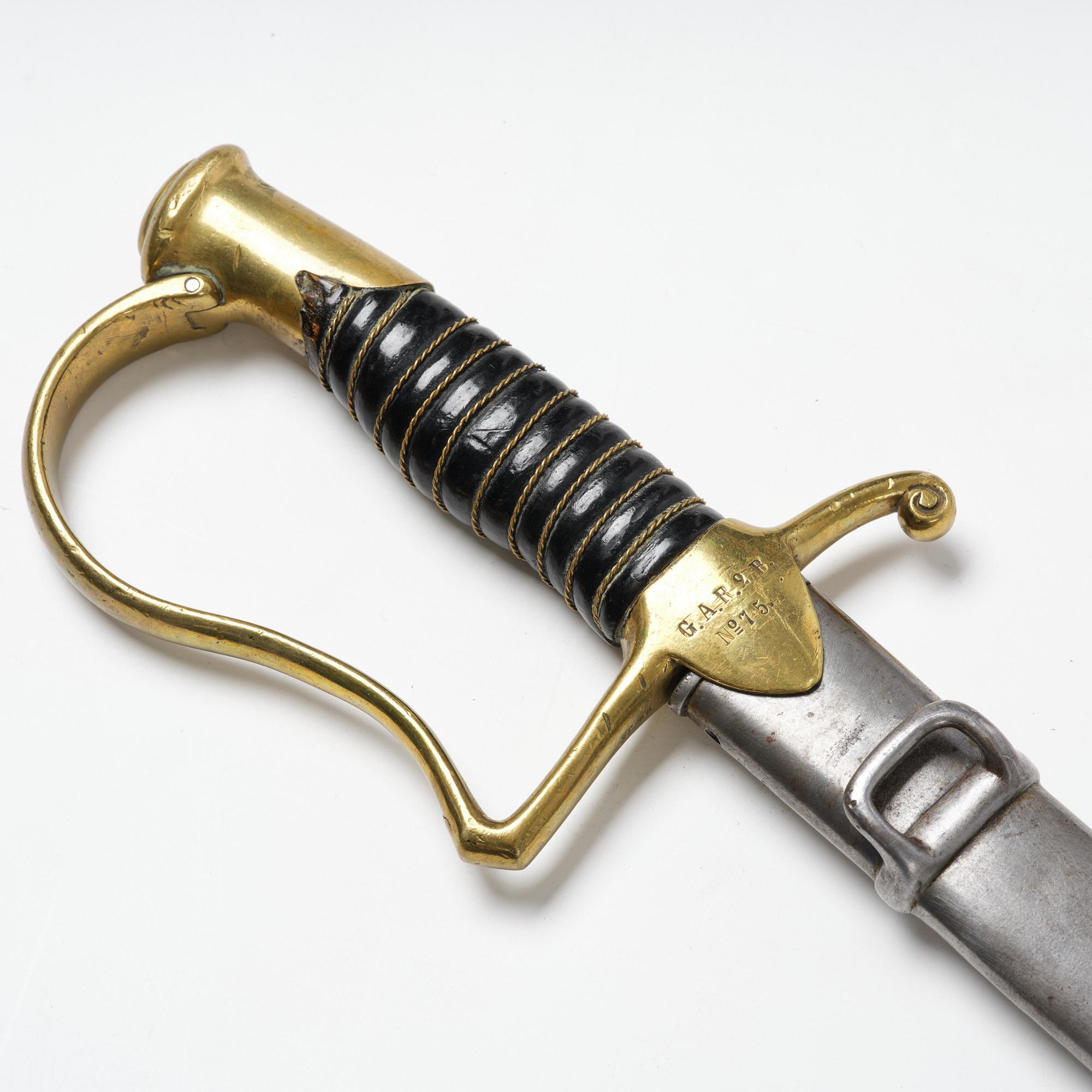 A Swedish artillery sword, 1889 pattern, with scabbard.