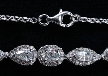 A NECKLACE, 6 navette, 8 dropp, 15 oval och 295  brilliant cut diamonds 6,50 ct. Si/I. 18K white gold.