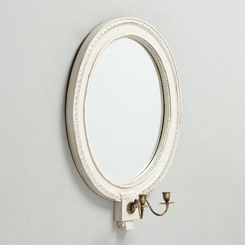 A 20th century, Gustavian style mirror sconce.