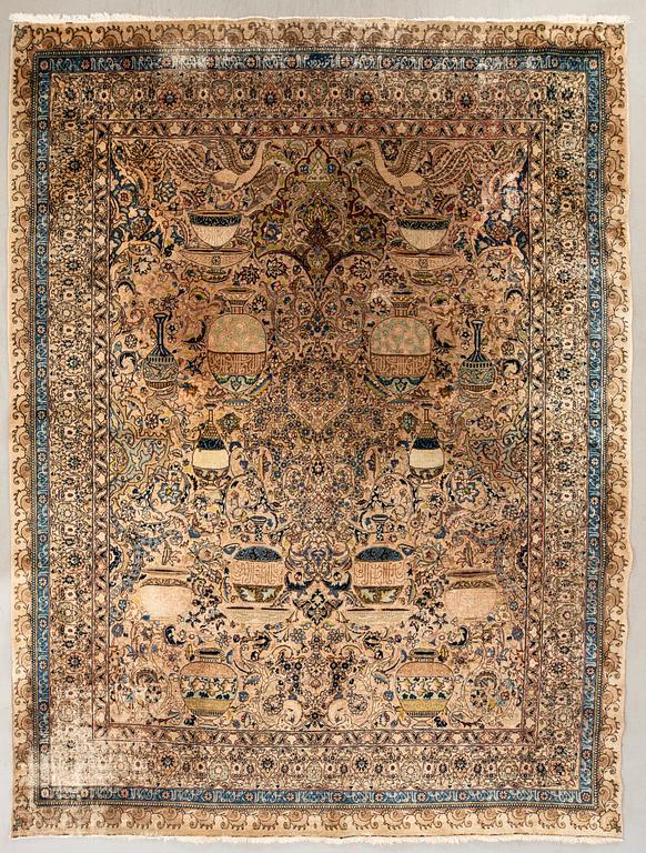 An antique Tabriz carpet, North West Persia, signed Akhondzadeh, c. 394 x 295 cm.