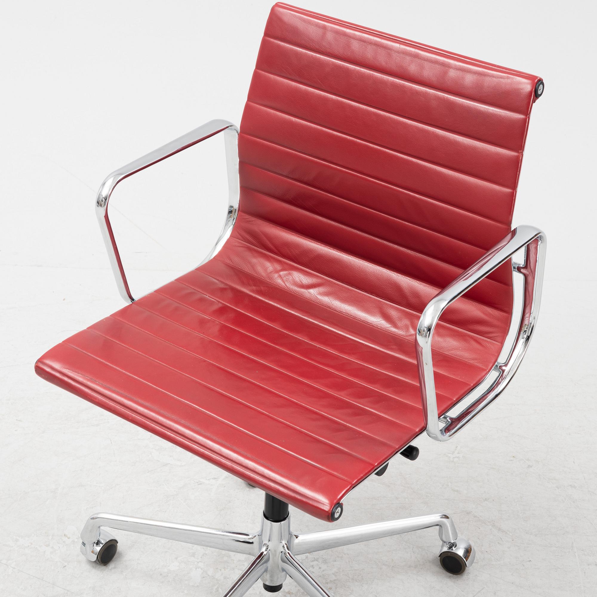 Charles & Ray Eames, a chrome swivel chair 'EA 118', Vitra.