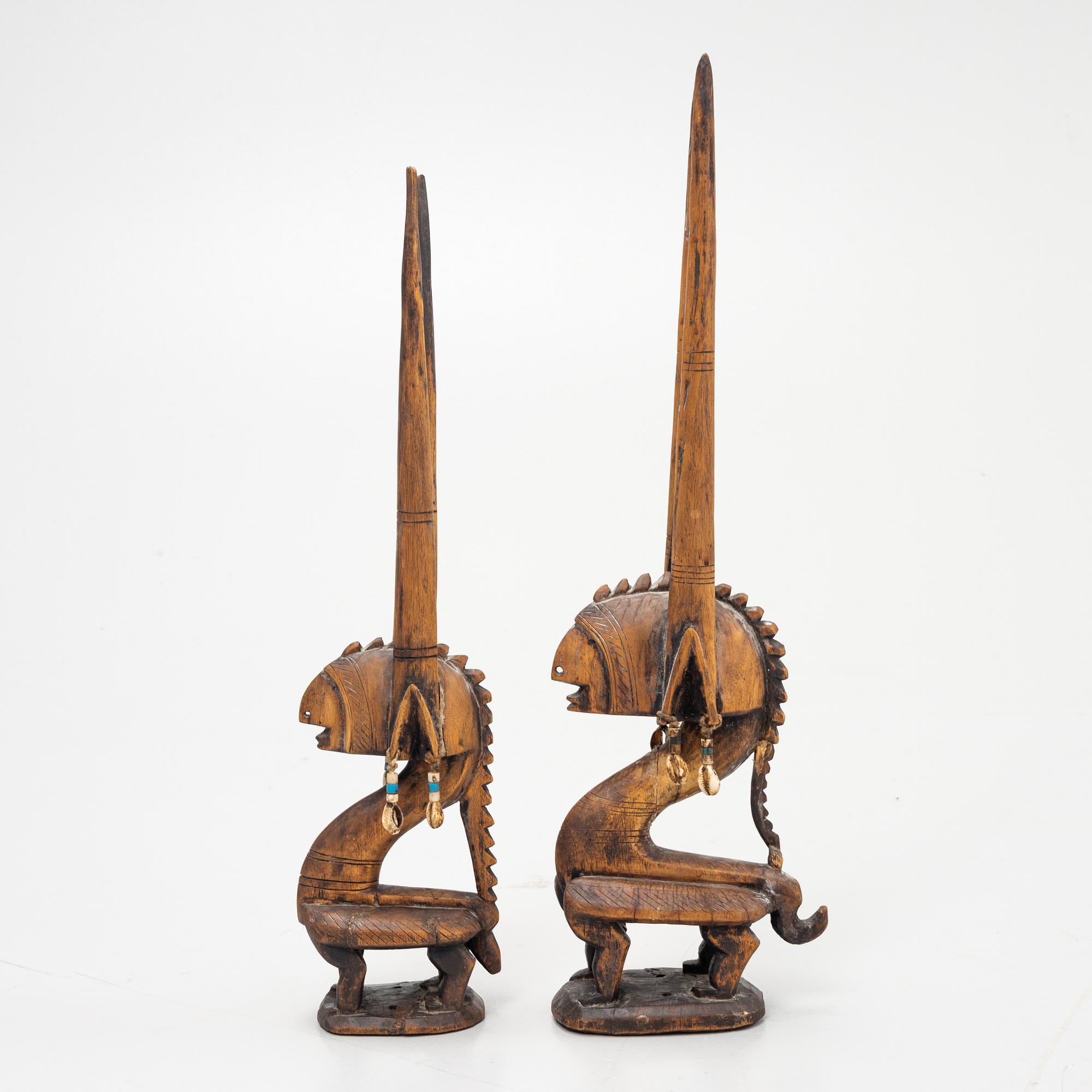 Twelve sculptures, reportedly from Makonde, Tanzania, Luba, Congo, and moore, from the second half of the 20:th century.