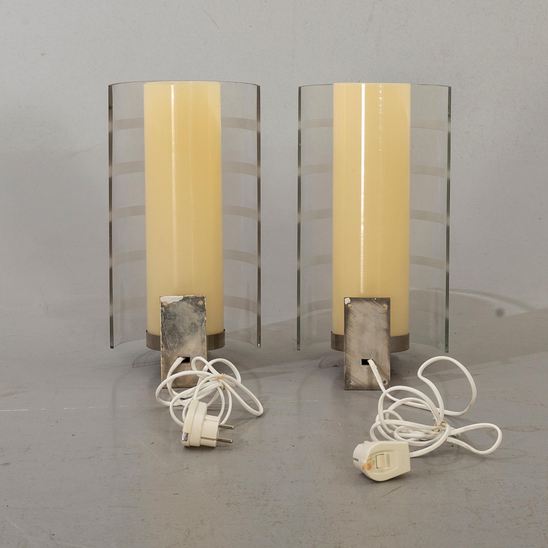 A pair of Swedish Art Deco wall lamps.
