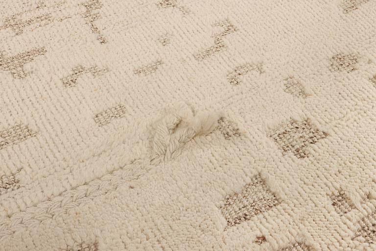 A Moroccan carpet, a. 292 x 246 cm.