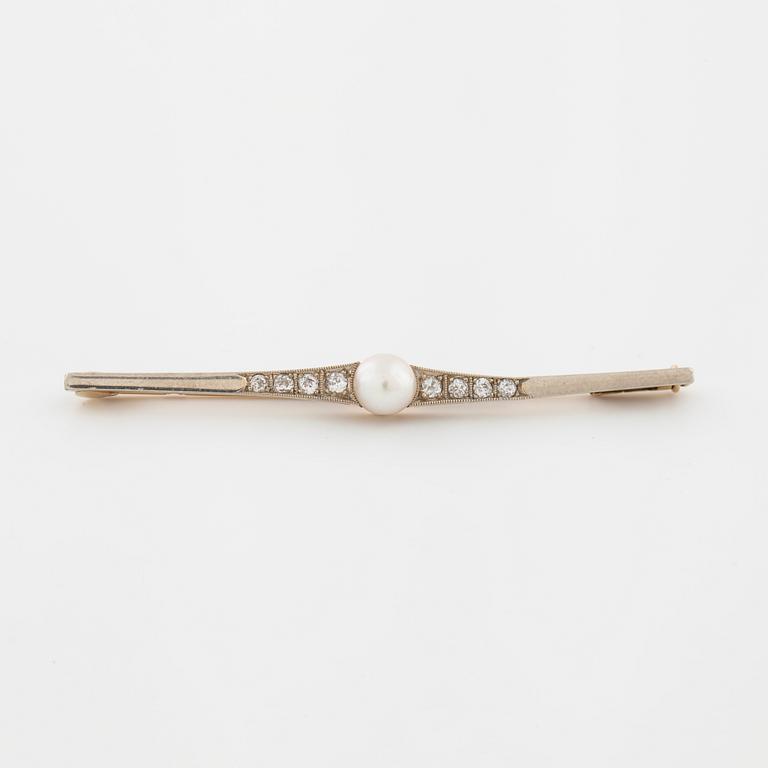 A cultured pearl and old cut diamond brooch.