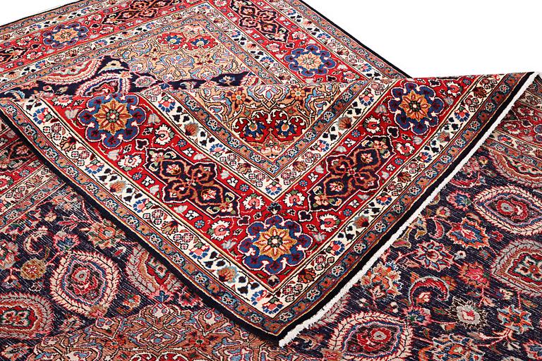 A Meshed carpet, c. 352 x 255 cm.