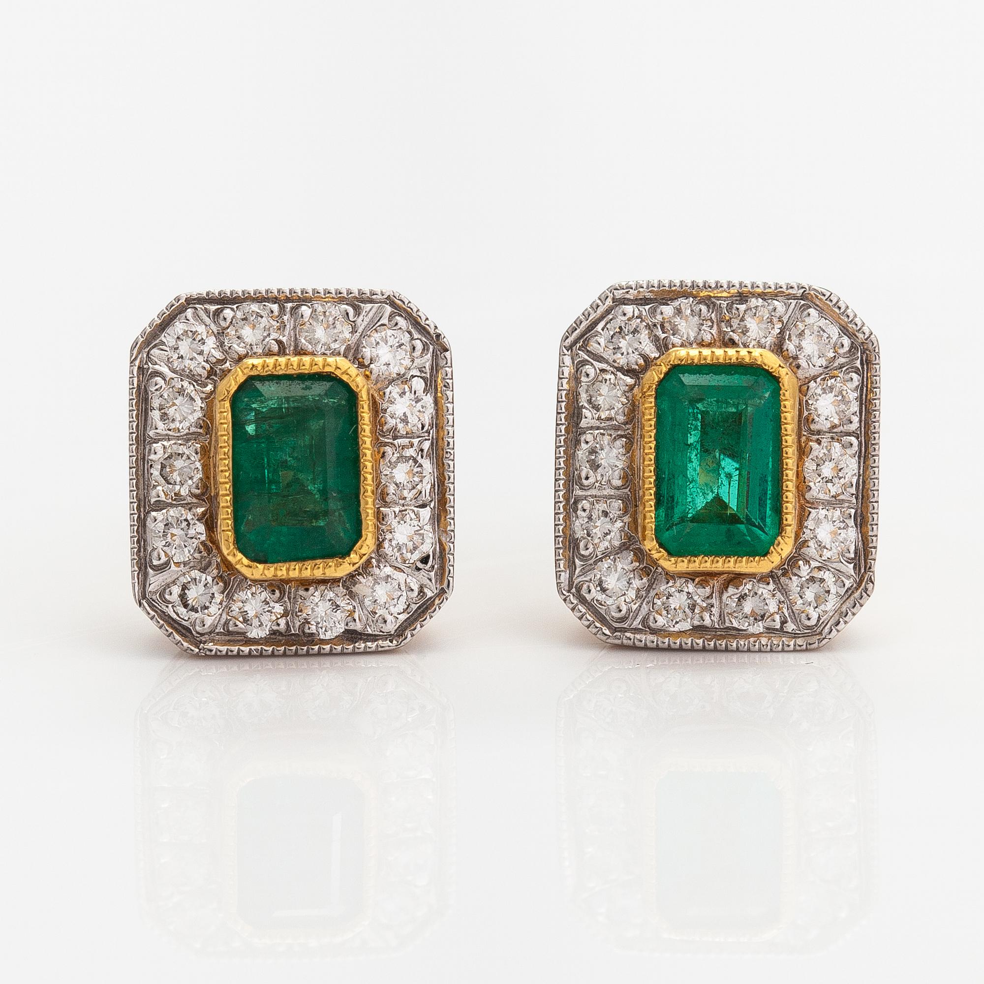 A pair of 18K gold earrings with emeralds and diamonds ca. 0.56 ct in total. Kultakeskus 1998.