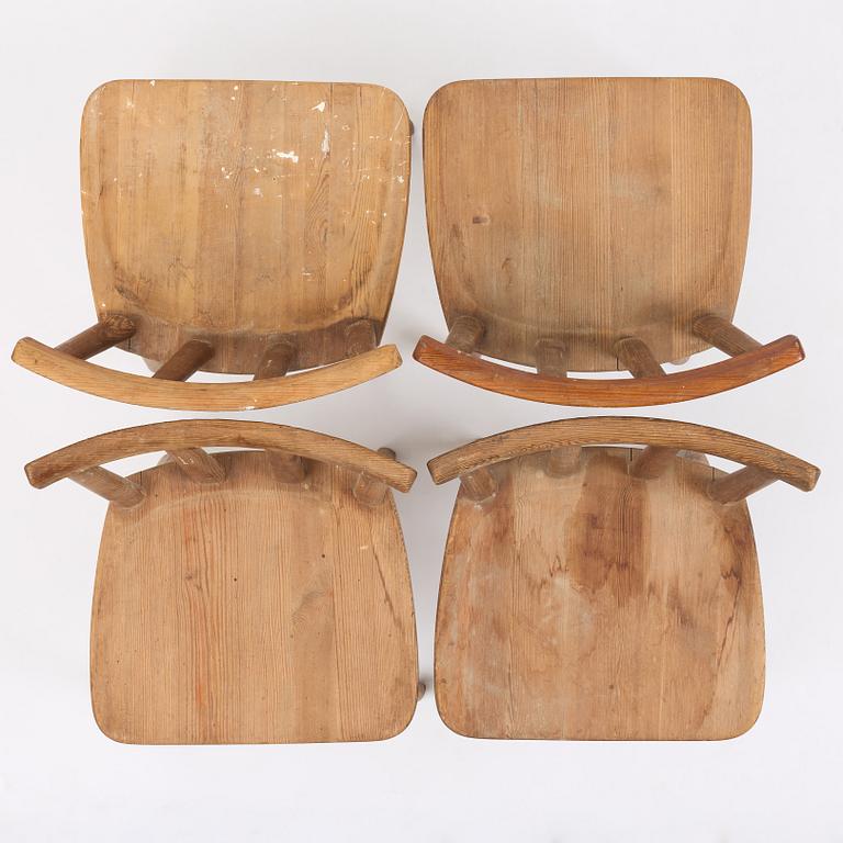 Axel Einar Hjorth, a set of four stained pine "Utö" chairs, Nordiska Kompaniet, Sweden, 1930s.