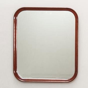 A Swedish mahogany mid 1900s mirror.