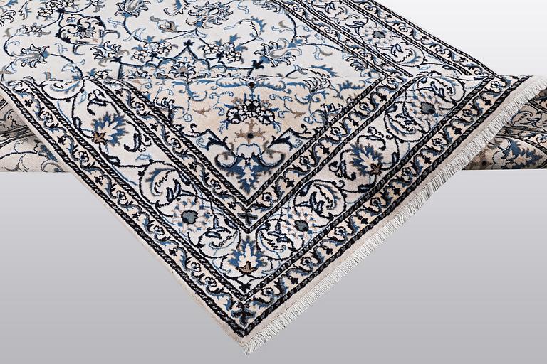 A rug, Nain, part silk, so called 9 LAA, ca 233 x 164 cm.