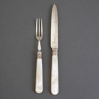 A set of 24 silver and mother of pearl cutlery by  Frederick C. Asman & Co, Sheffield, England, 1907.