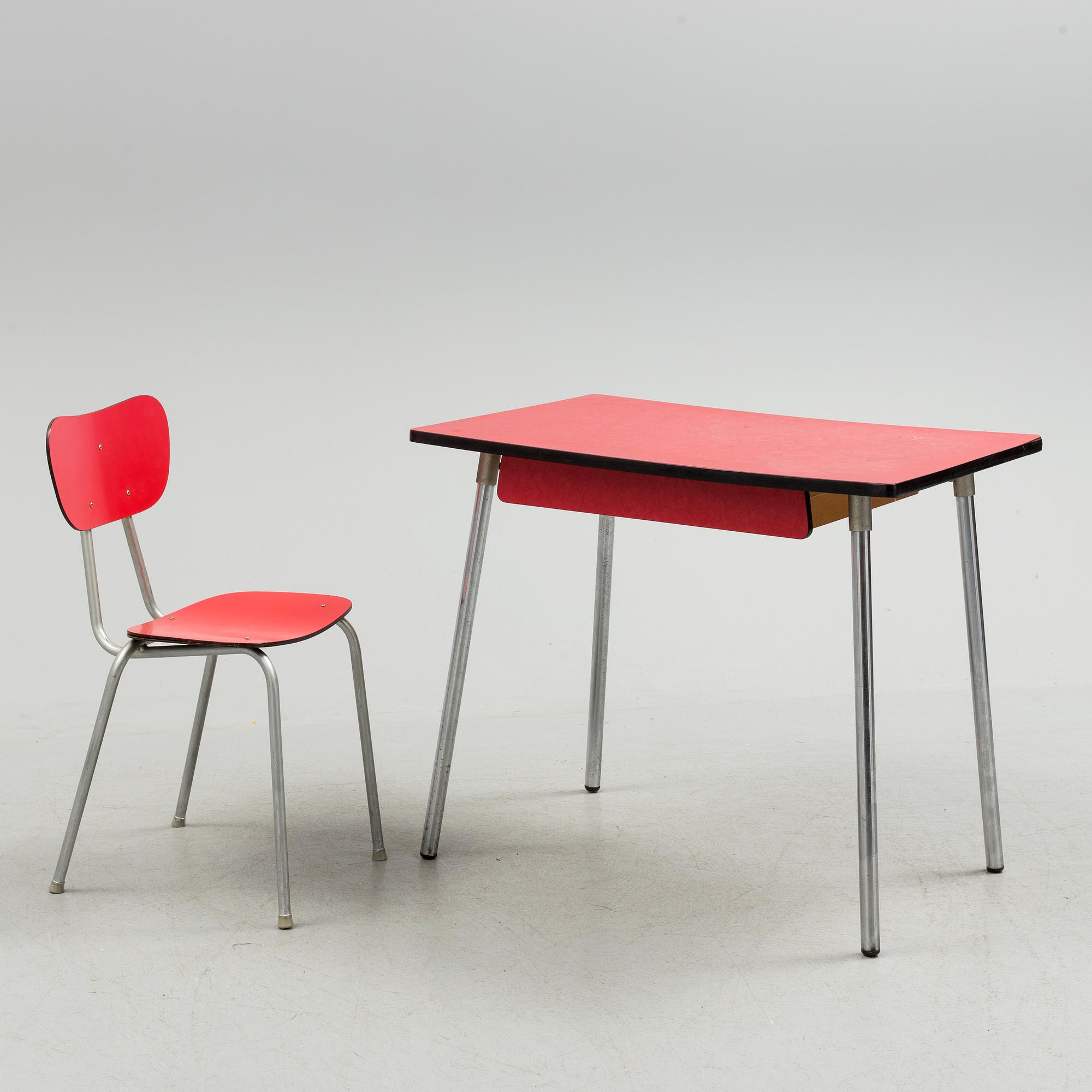 A mid 20th century table and chair.