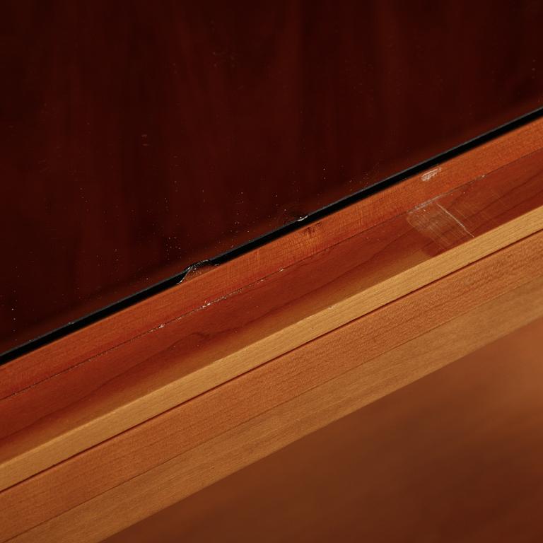 A model 2135 cabinet by Josef Frank for Firma Svenskt Tenn.