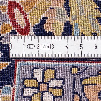 An oriental figural silk rug, around 181 x 124 cm.