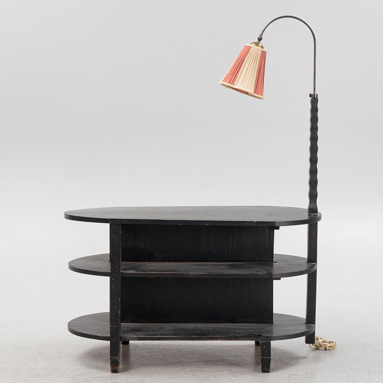 A painted side table with lamp, first half of the 20th Century.