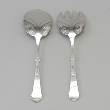 A Danish Art Nouveau silver serving spoon and fork, maker's mark Axel Oluf Olsen, Copenhagen 1914.