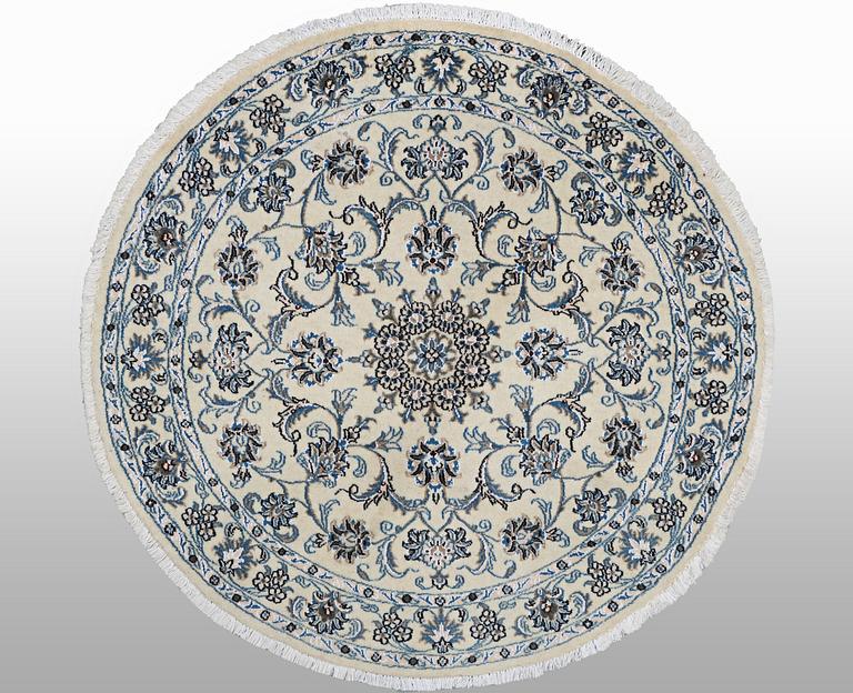 A rug, Nain, part silk, ca 316 x 136 cm.