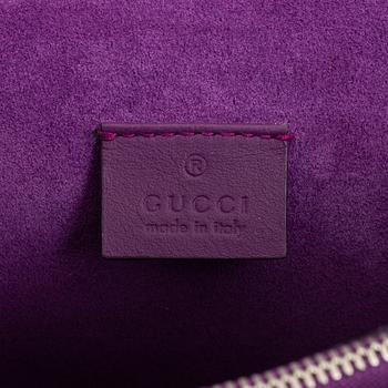 Gucci, a 'Dionysus' handbag.