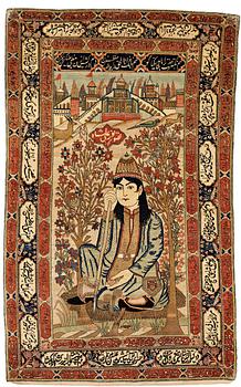 268. A RUG, a semi-antique/antique Kashan figural, "Motachem", ca 217 x 135 cm (as well as one end with 2,5 cm flat weave).