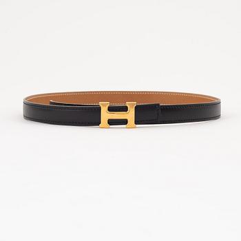 Hermès, a 'Constance' reversible leather belt, size 65, 1985.