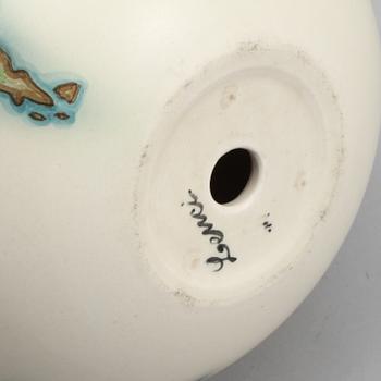 A Mario Sturani (decoration) & Helen König Scavini (form) 'Sul Mondo' glazed earthenware figure, Lenci, Italy 1930's.