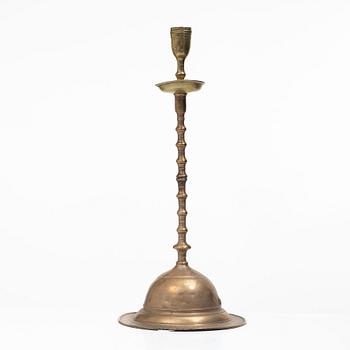A presumably Flemish 17th century baroque candlestick incorporating later elements.