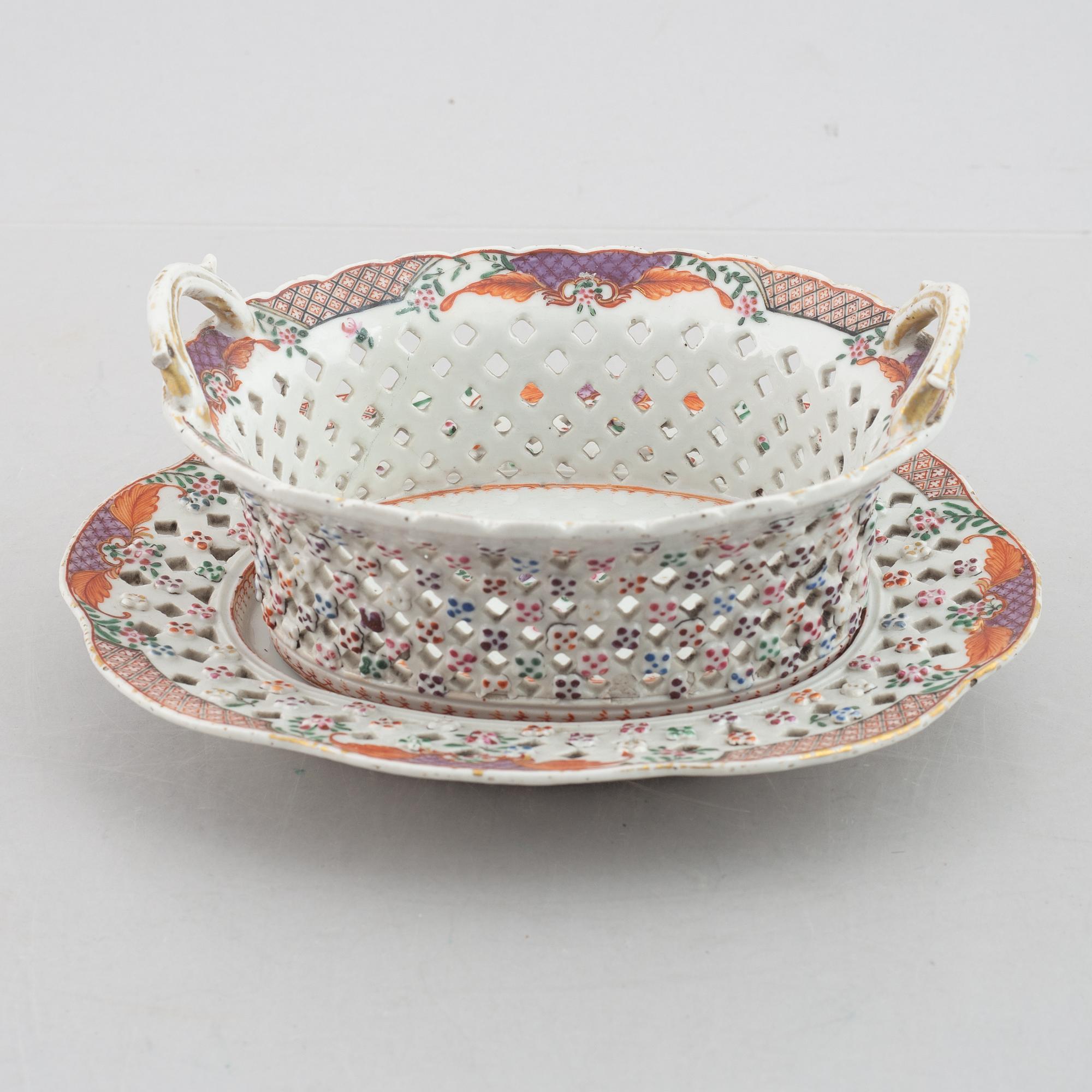 A famille rose chesnut basket with stand, Qing dynasty, 18th century.