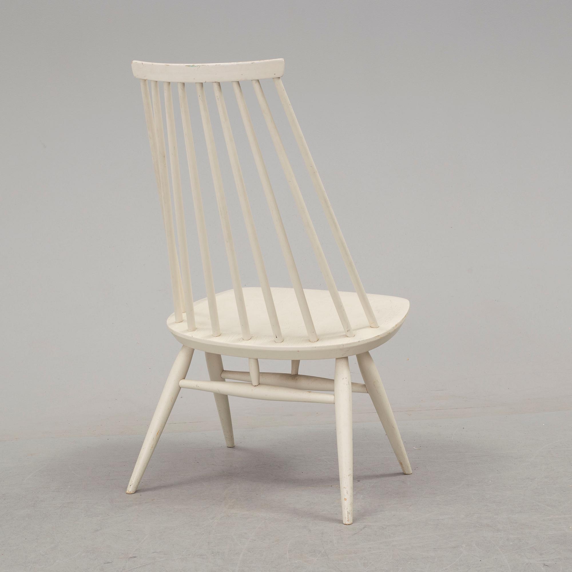A second half of the 20th century 'mademoiselle' chair by Ilmari Tapiovaara.