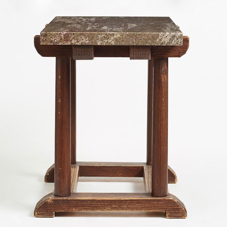 Axel Einar Hjorth, a "Sandhamn" stained pine and granite top table, Nordiska Kompaniet, Sweden 1930's.