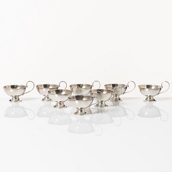 Eight Swedish silver punsch mugs, including K&EC, Gothenburg 1965.