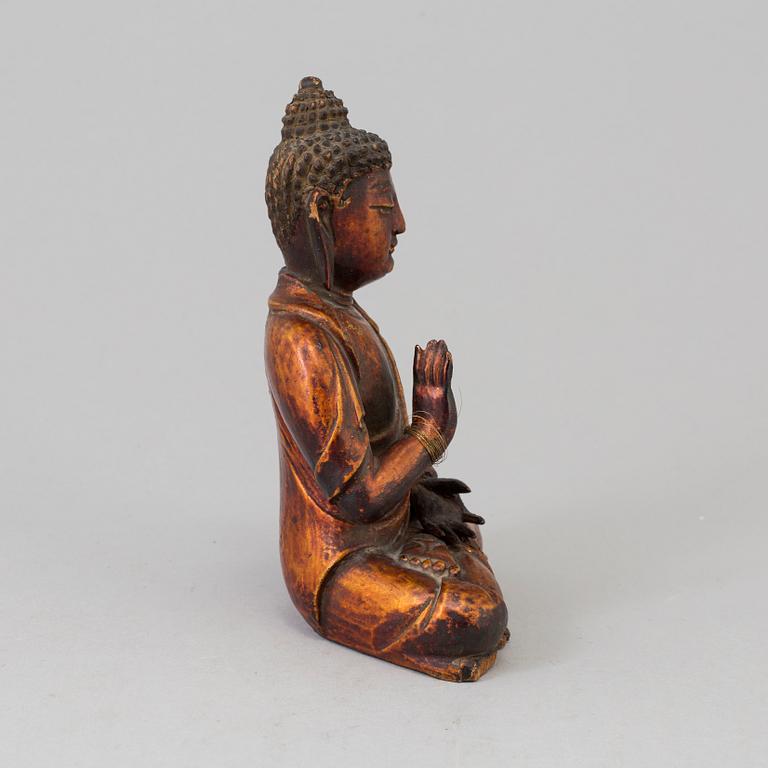 A Japanese carved wooden sculpture, late 19th century.