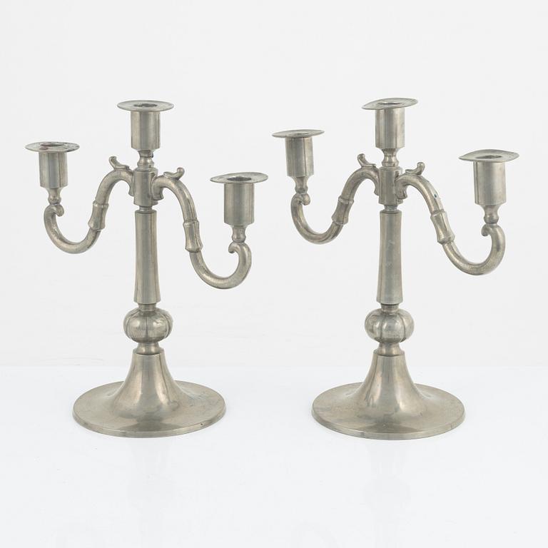 Edvin Ollers, a pair of pewter candelabra, Stockholm, 1922.