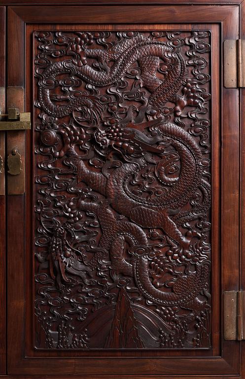 A large Imperial Hongmu compound cabinet, Qing dynasty, 19th century.