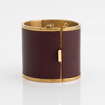 Céline, bangle, gold-tone metal and leather.