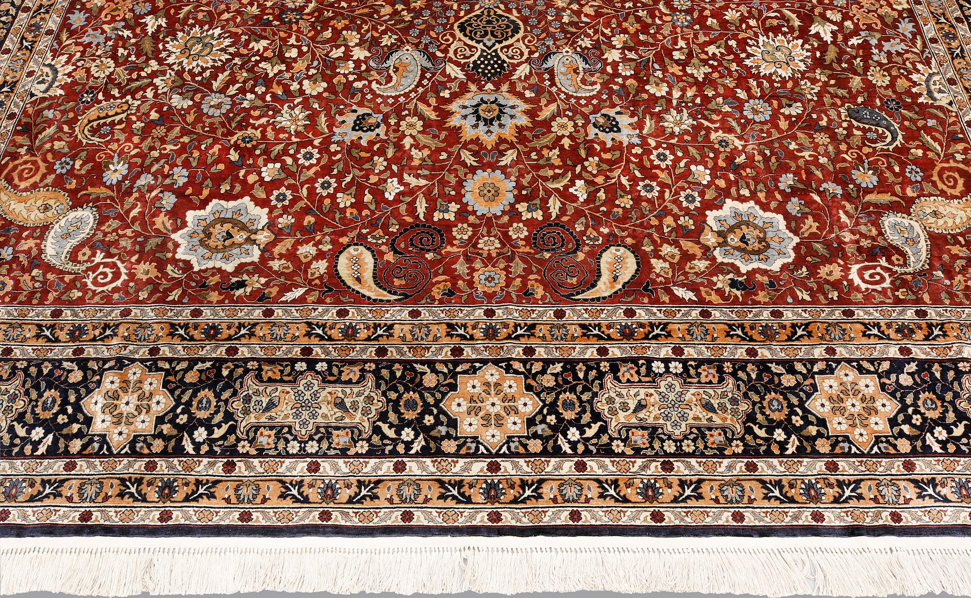 A pictoral Oriental silk carpet, ca 370 x 270 cm.