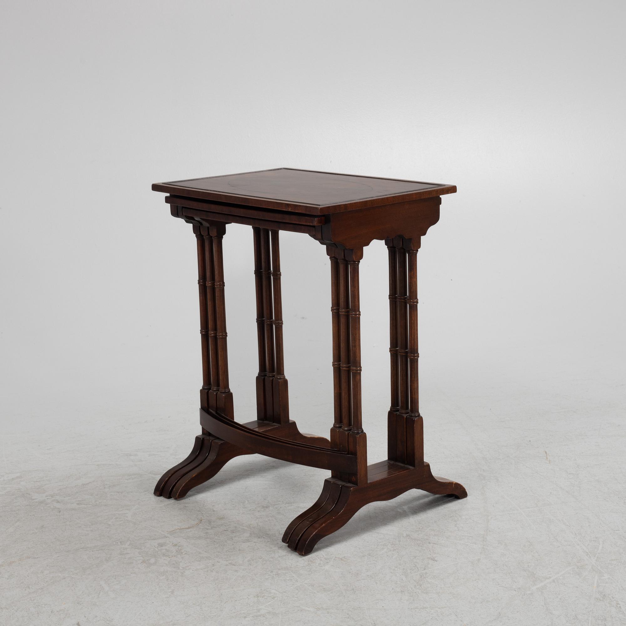 Three-piece nest of tables, mid-20th century.