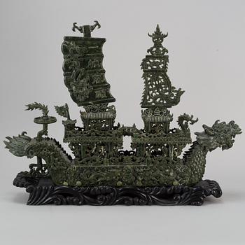 A large Chinese green stone carved sculpture, 20th century.