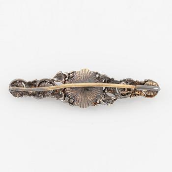 Brooch in silver and 18K gold set with rose-cut diamonds.