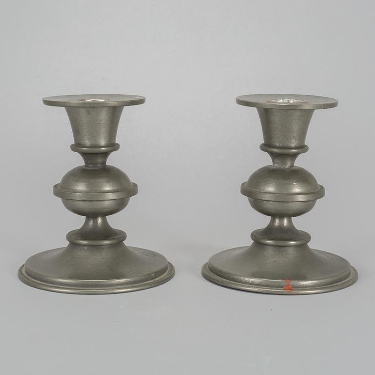 EDVIN OLLERS, a pair of peewter candlesticks, Stockholm 1950.