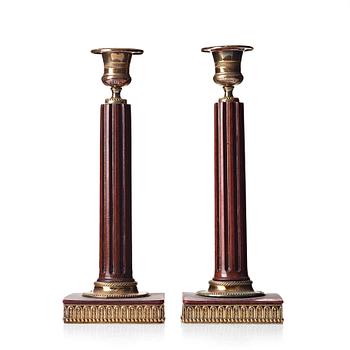 87. A pair of late Gustavian candlesticks.