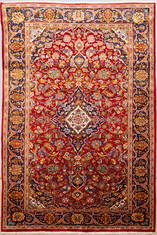 A carpet from Golpaigan. Circa 295 x 200 cm.