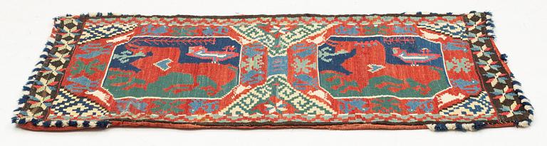A double-interlocked tapestry carrige cushion, ca 100 x 55 cm, "Bäckahästen" last quater of the 18th century.