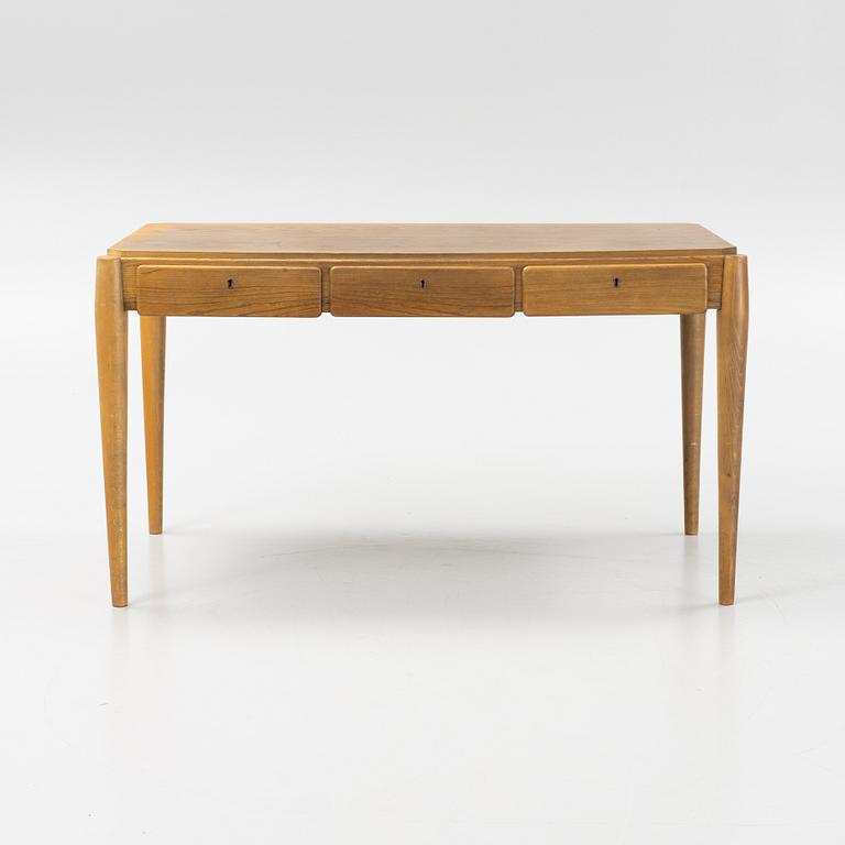 An elm desk, mid 20th Century.