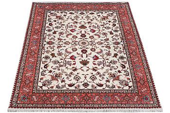 A rug, Tabriz, part silk, 50 raj, ca. 207 x 152 cm.