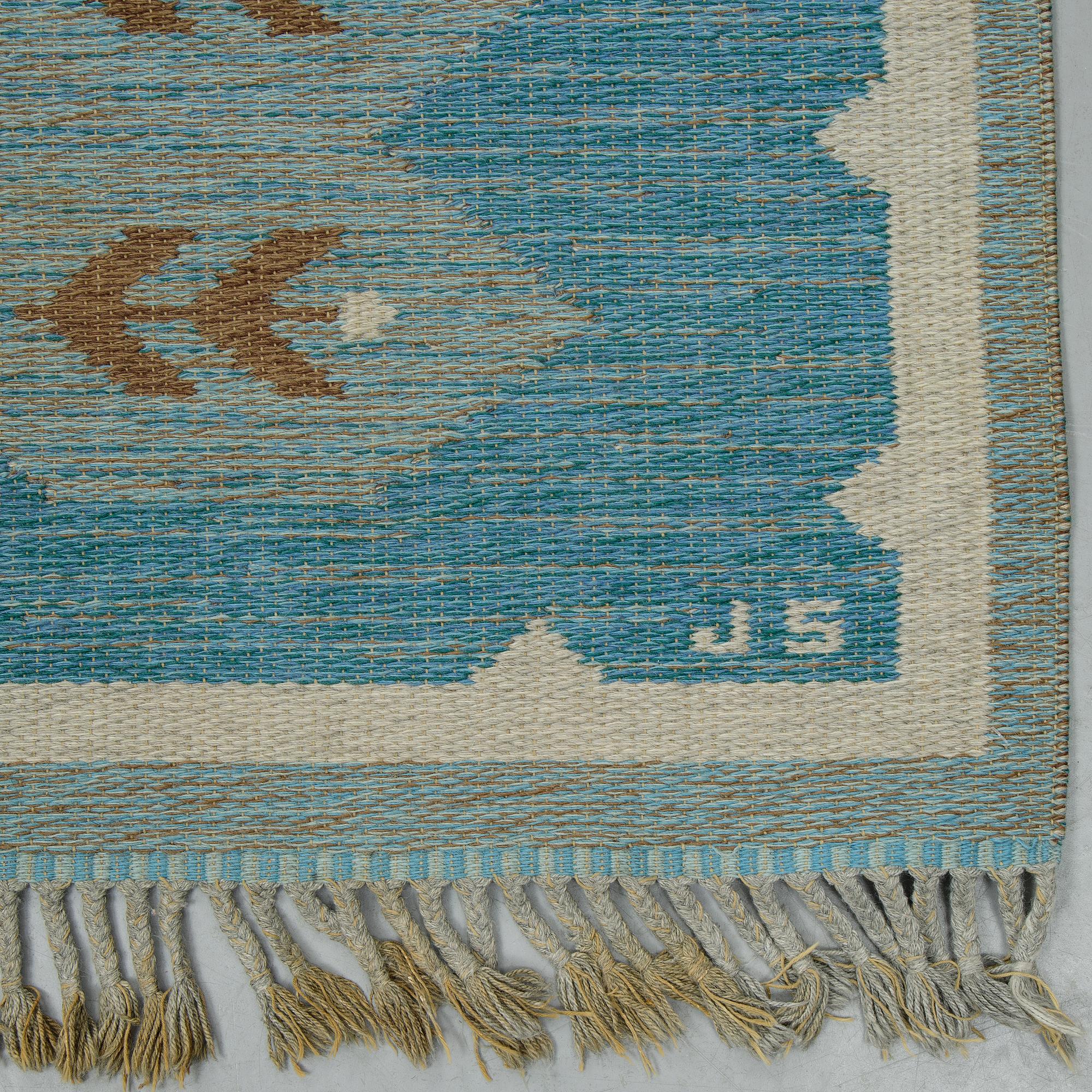 Matto, a machine-made double weave, ca 224 x 165 cm, signed JS.