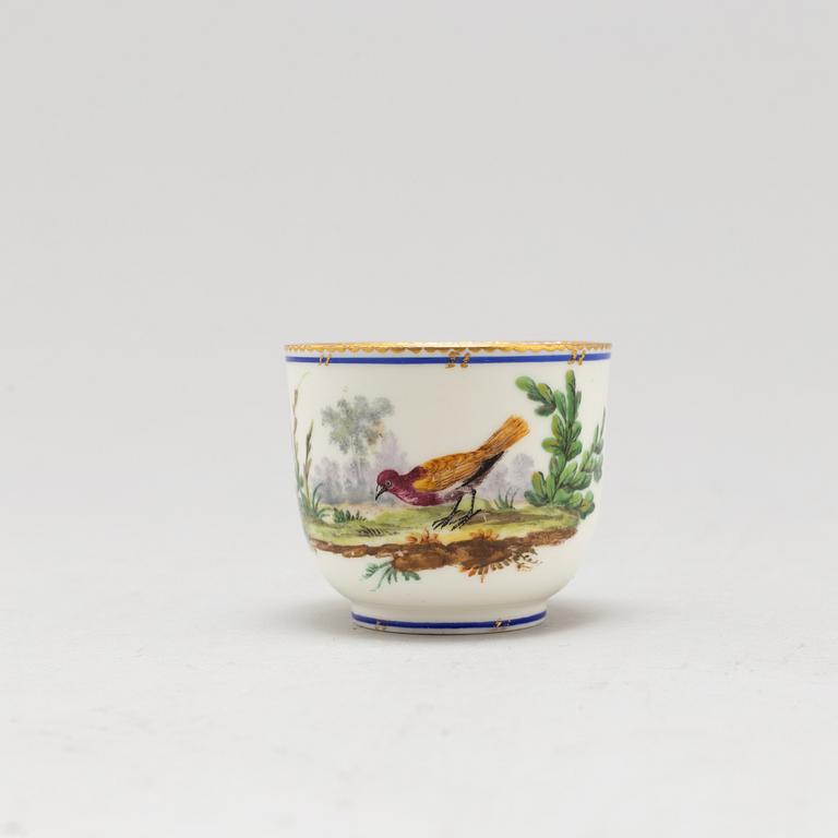 A pair of cups and saucers, "Sévrès"like mark, 19th century.